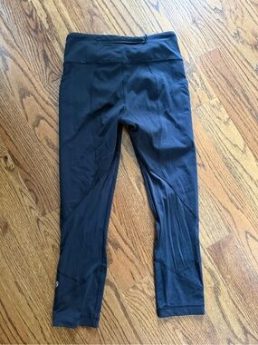 lululemon Leggings with sort of a mesh area as shown. Shorter length